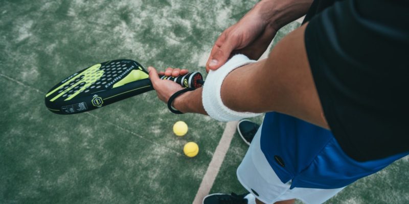 person holding tennis racket